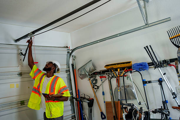 Professional Garage Door Panel Replacement technician working in Akron, IA
